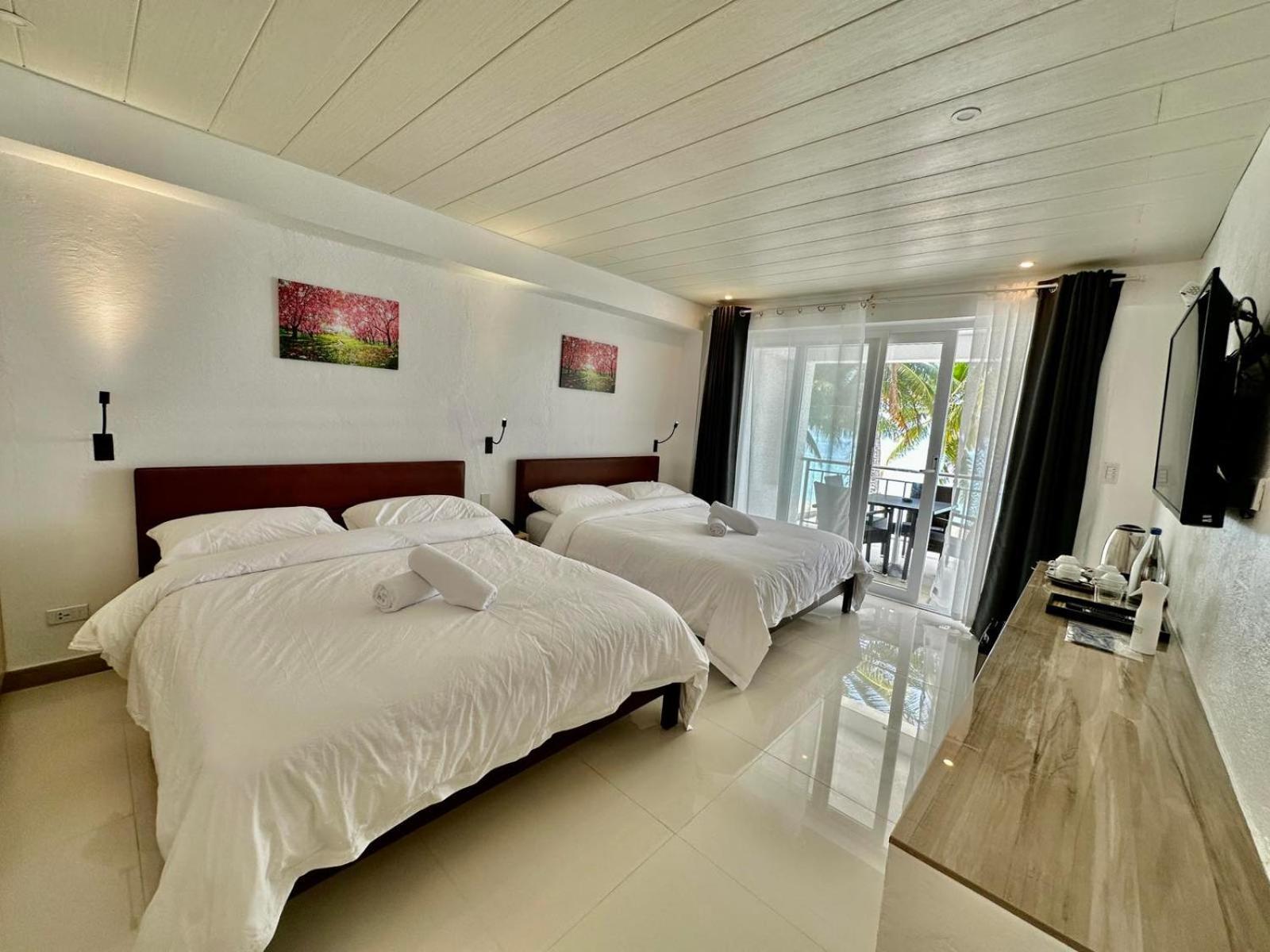 Calypso Beach And Dive Resort Manoc-Manoc Eksteriør bilde